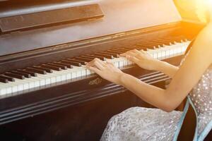 Beautiful piano background are set by the window in the morning waiting for the pianist to come to practice in the morning to reduce the mistake of having to perform the piano performance at a concert photo