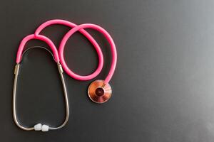 image blur doctor's stethoscope is prepared when it comes to emergencies, when there is an accident patient or the patient is unconscious because the stethoscope is used to listen to the heartbeat. photo