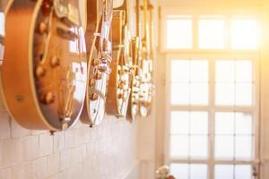 Guitars that were kept in the music practice room It is a guitar that is provided for musicians to practice and learn before performing in order to reduce the mistake of playing guitar on stage. photo