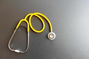 image blur doctor's stethoscope is prepared when it comes to emergencies, when there is an accident patient or the patient is unconscious because the stethoscope is used to listen to the heartbeat. photo