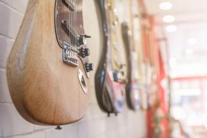 Guitars that were kept in the music practice room It is a guitar that is provided for musicians to practice and learn before performing in order to reduce the mistake of playing guitar on stage. photo