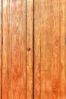 The texture and pattern of teak doors that look beautiful and have natural patterns that are unique to each piece of wood and teak are also commonly used to make furniture because of the strength. photo