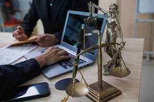 statue of god Themis Lady Justice is used as symbol of justice within law firm demonstrate truthfulness of facts and power to judge without prejudice. hemis Lady Justice symbol of honesty and justice. photo