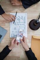 The businessman offered cash to prosecutors as a bribe to help change the verdict in the case, knowing that bribery is a serious and illegal crime. The concept of bribing government officials photo