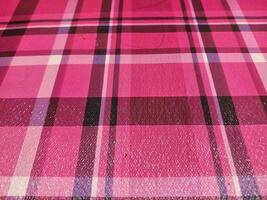 Red checkered tablecloth background. Great for adding creative design elements. photo