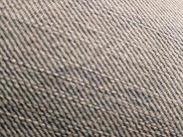 Rough fabric background texture. Suitable for clothing advertising additional design projects. photo