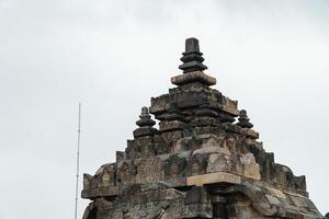 Plaosan Temple in Klaten, Central Java, Indonesia is a historical place and a popular tourist destination. Plaosan Temple is a Buddhist temple with ancient stone buildings arranged into buildings photo
