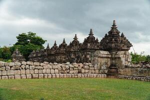 Plaosan Temple in Klaten, Central Java, Indonesia is a historical place and a popular tourist destination. Plaosan Temple is a Buddhist temple with ancient stone buildings arranged into buildings photo