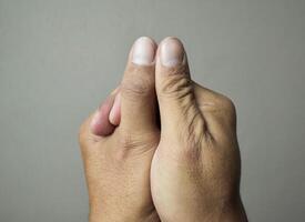 The wound was cut on the thumb. Wounds are caused by knive photo