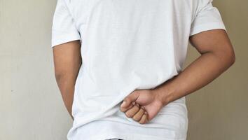 close up man have back pain concepts photo