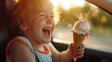 a child is sitting in a car and eating an ice cream cone photo