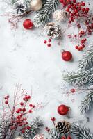 Festive winter decor with pine branches, red berries and Christmas balls, copy space. photo