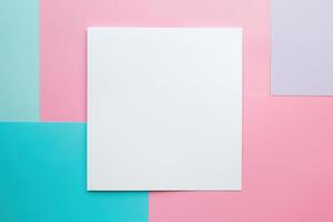 Blank white square card on multicolored paper background photo