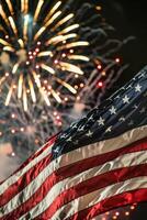 American flag waving before fireworks display at night photo