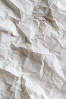Crumpled white paper texture, vertical background, close up view. photo