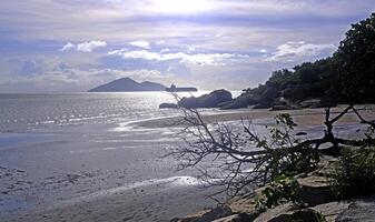 Beach, coastline, water waves, ocean, island and clouds photo