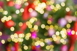 Multi colored Christmas blurred background with bokeh photo