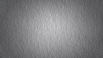 Rough gray surface with spot light as background photo