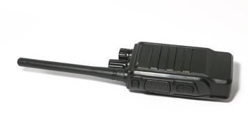 Black portable radio ht or walkie talkie in a white background photo