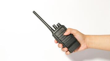 Black portable radio ht or walkie talkie in a white background photo