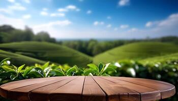 Circle wooden table top with blurred tea plantation landscape with blue sky and blurred green tea garden Natural background product display concept. photo