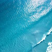Abstract water wallpaper background , water texture blue tone. abstract background of beach photo