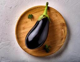 Top of view of fresh eggplant with stem on the white background photo