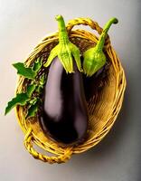 Top of view of fresh eggplant with stem on the white background photo