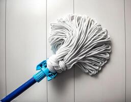 Top of view one mop on the white background photo