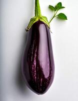 Top of view of fresh eggplant with stem on the white background photo