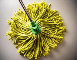 Top of view one mop on the white background photo