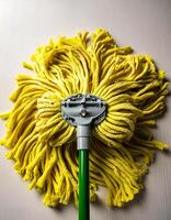 Top of view one mop on the white background photo