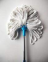 Top of view one mop on the white background photo