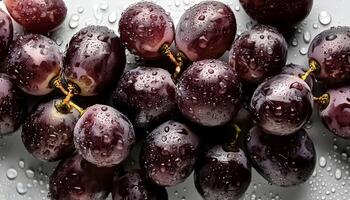 Fresh a pile of grapes against a white background adorned with glistening water droplets seamless. mock up. view. top. flat lay photo
