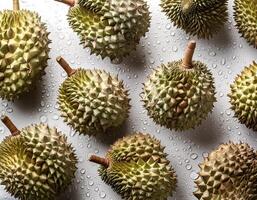 fruit concept. Fresh a pile of durian against a white background photo