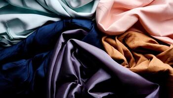 Colorful plain fabric texture with creative, smooth and crumpled or shabby patterns as background photo