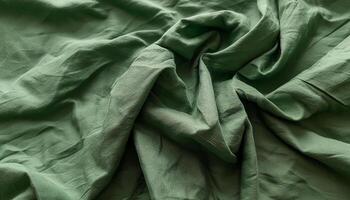 Texture of crumpled fine green cotton fabric as background. Shabby bed sheets. top view.pattern texture background photo