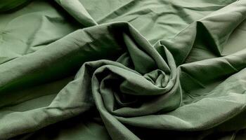 Texture of crumpled fine green cotton fabric as background. Shabby bed sheets. top view.pattern texture background photo
