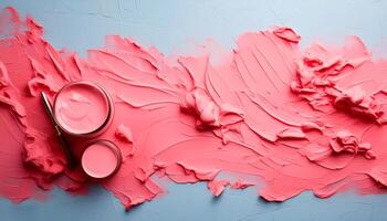 Abstract pink oil paint texture on blue canvas or wall. Minimalistic background with copy space. photo