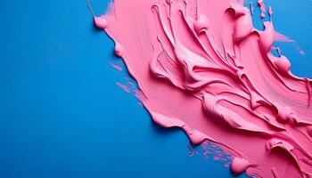 Abstract pink oil paint texture on blue canvas or wall. Minimalistic background with copy space. photo