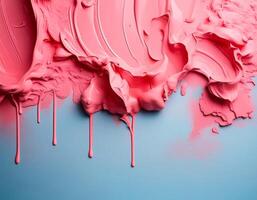 Abstract pink oil paint texture on blue canvas or wall. Minimalistic background with copy space. photo