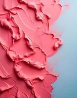 Abstract pink oil paint texture on blue canvas or wall. Minimalistic background with copy space. photo