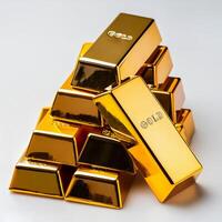 Gold bars ingot isolated on white background. flat lay background concept with copy space. photo