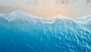 empty abstract sand beach with palm leaf shadow and transparent water wave from above, blank background banner for travel, vacation and wellbeing with copy space. top of views, aerial views. photo