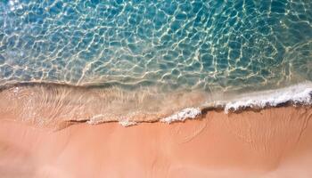 empty abstract sand beach with palm leaf shadow and transparent water wave from above, blank background banner for travel, vacation and wellbeing with copy space. top of views, aerial views. photo