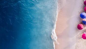 empty abstract sand beach with palm leaf shadow and transparent water wave from above, blank background banner for travel, vacation and wellbeing with copy space. top of views, aerial views. photo