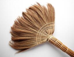 Top of view one broom stick on the white background photo