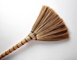 Top of view one broom stick on the white background photo