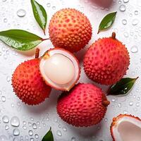 Creative food concept. Fresh a pile of Top view of half ripe Fresh ripe Red Lychee fruit isolated on white background. photo