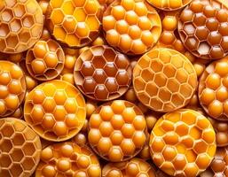 Full frame background Sweet honey. Honeycombs with sweet golden honey on whole background, close up. Background texture and pattern of section of wax honeycomb. flat lay. top of views photo